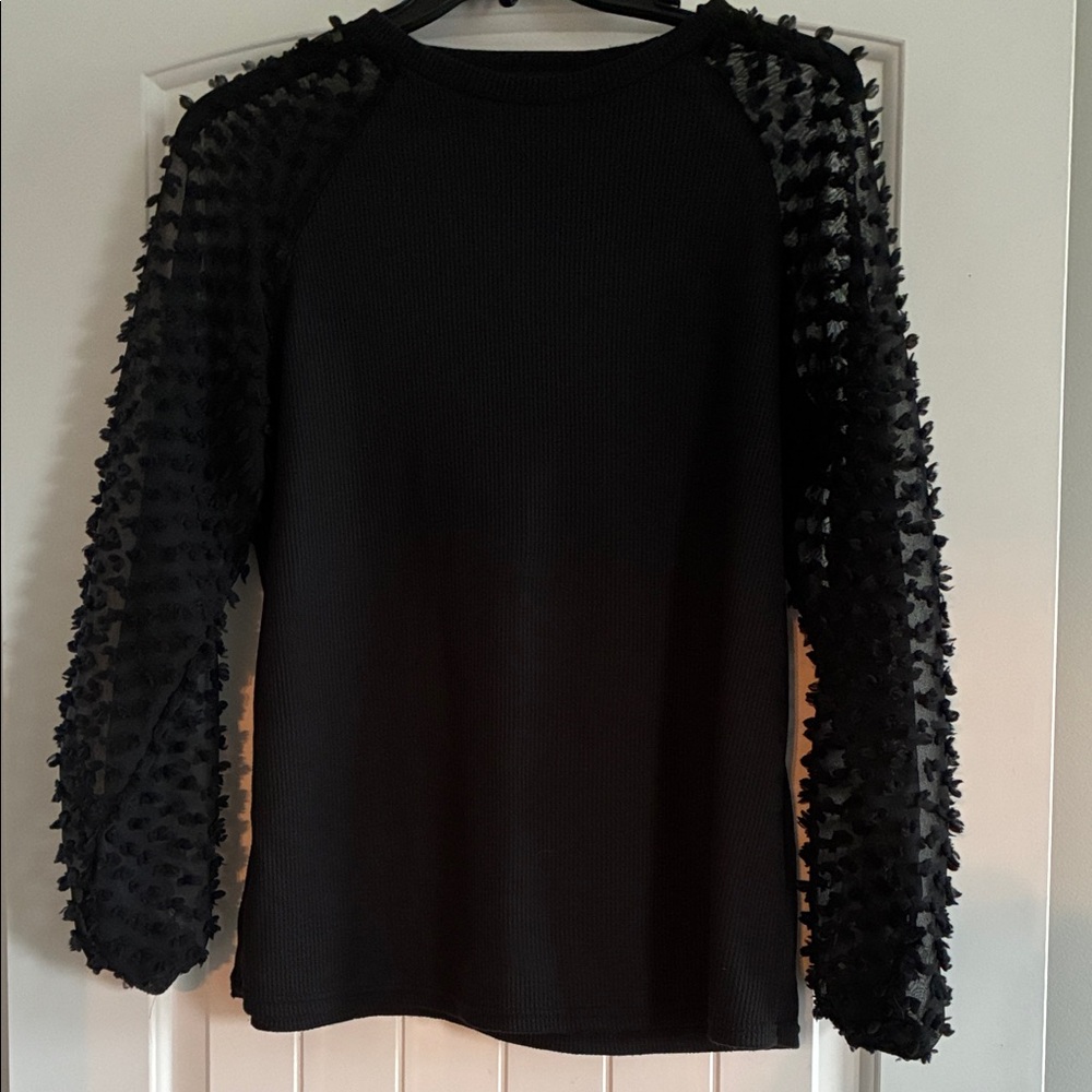 Elegant Black Sweater with Textured Sleeves